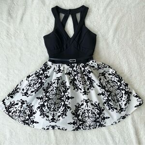 Crystal Doll Black and White Patterned Short Homecoming Dress with Velvet Detail